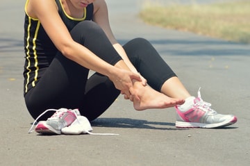 WOman with ankle pain